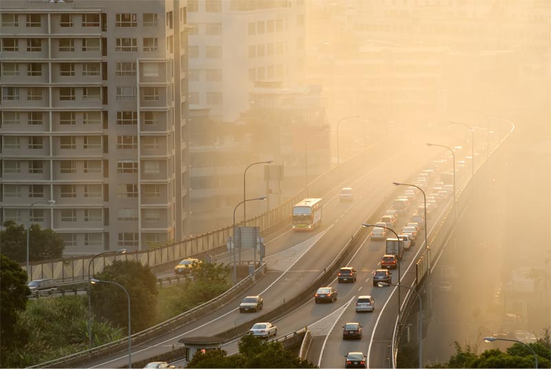 Air,Pollution,Scenic,With,Cars,On,Highway,And,Yellow,Smoke